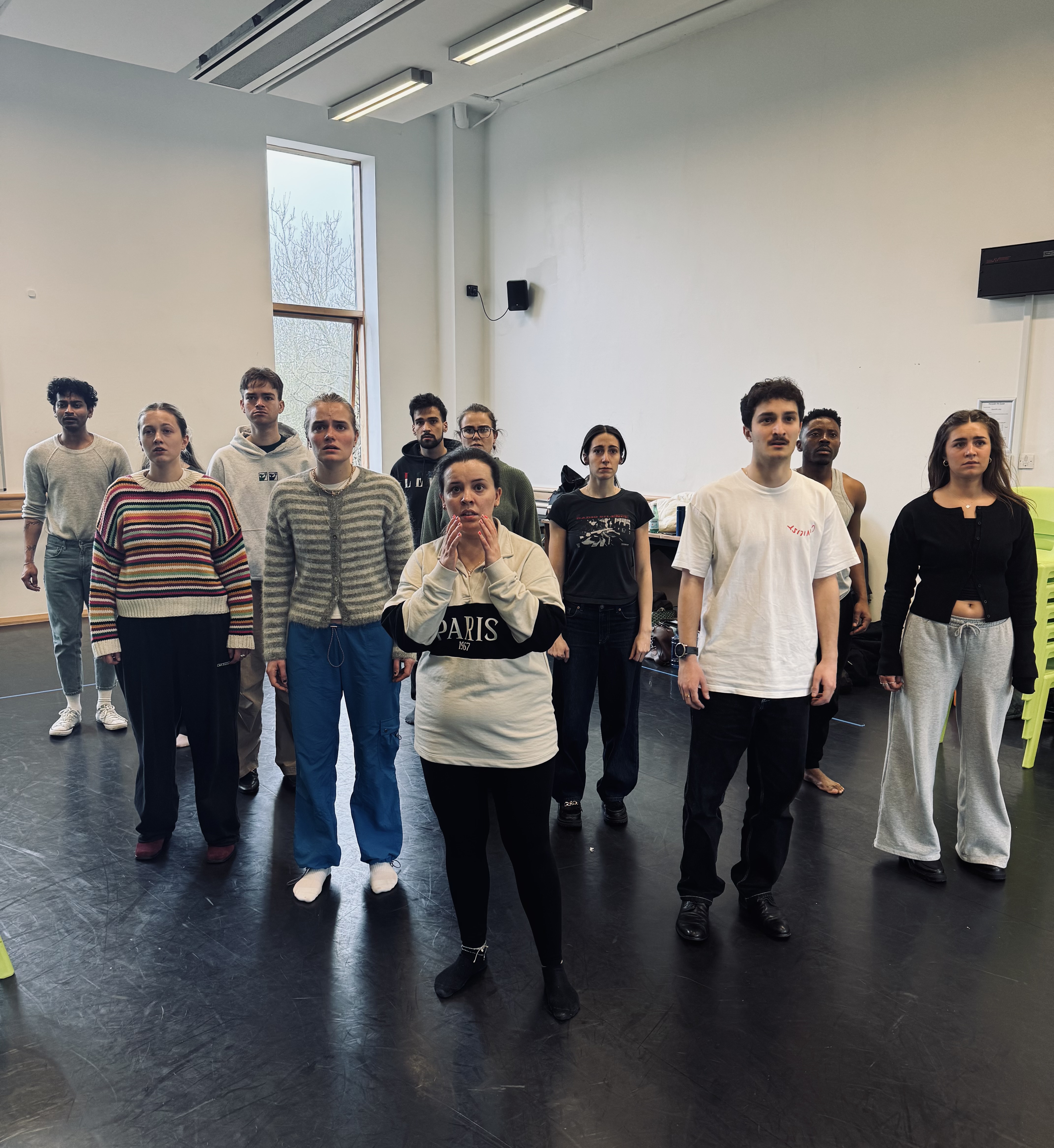 Performers developing new work in a rehearsal room